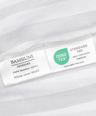 Bamboe beddengoed met witte/olijfkleurige strepen en brede randen