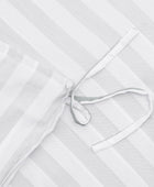 Bamboe beddengoed met witte/olijfkleurige strepen en brede randen