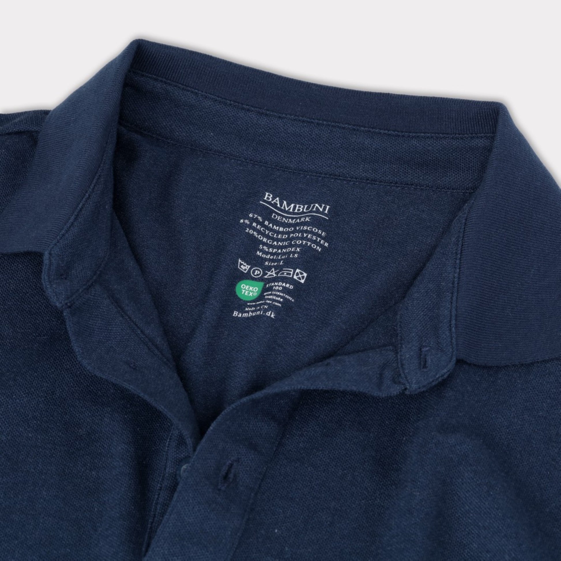 Herenpolo met lange mouwen van bamboe in marineblauw