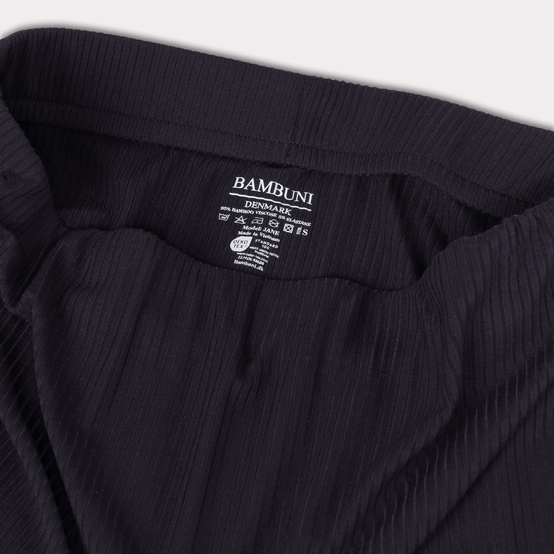 Damesrok van bamboe met ribboord in marineblauw