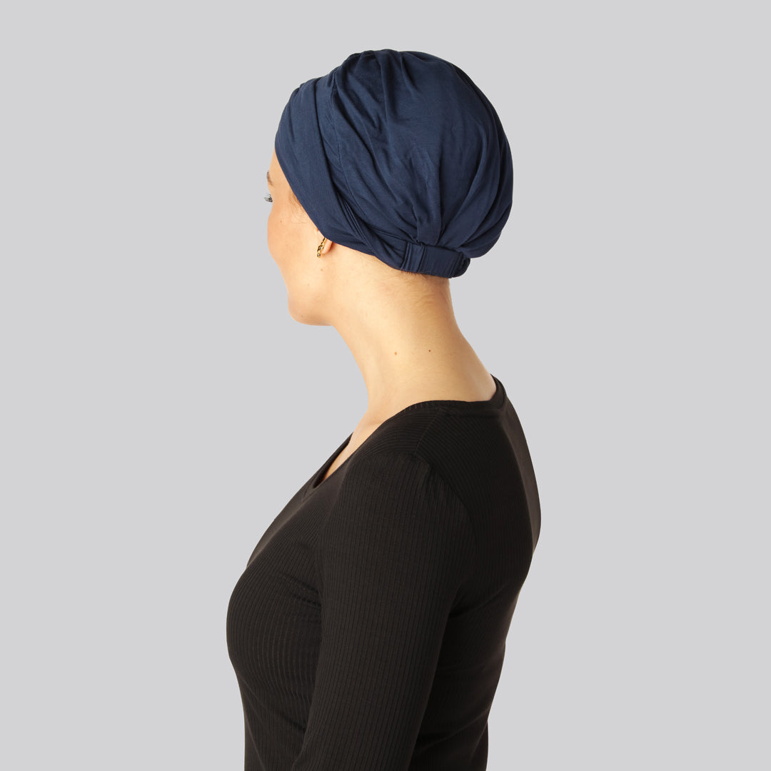 Gedraaide bamboe tulband in marineblauw voor dames