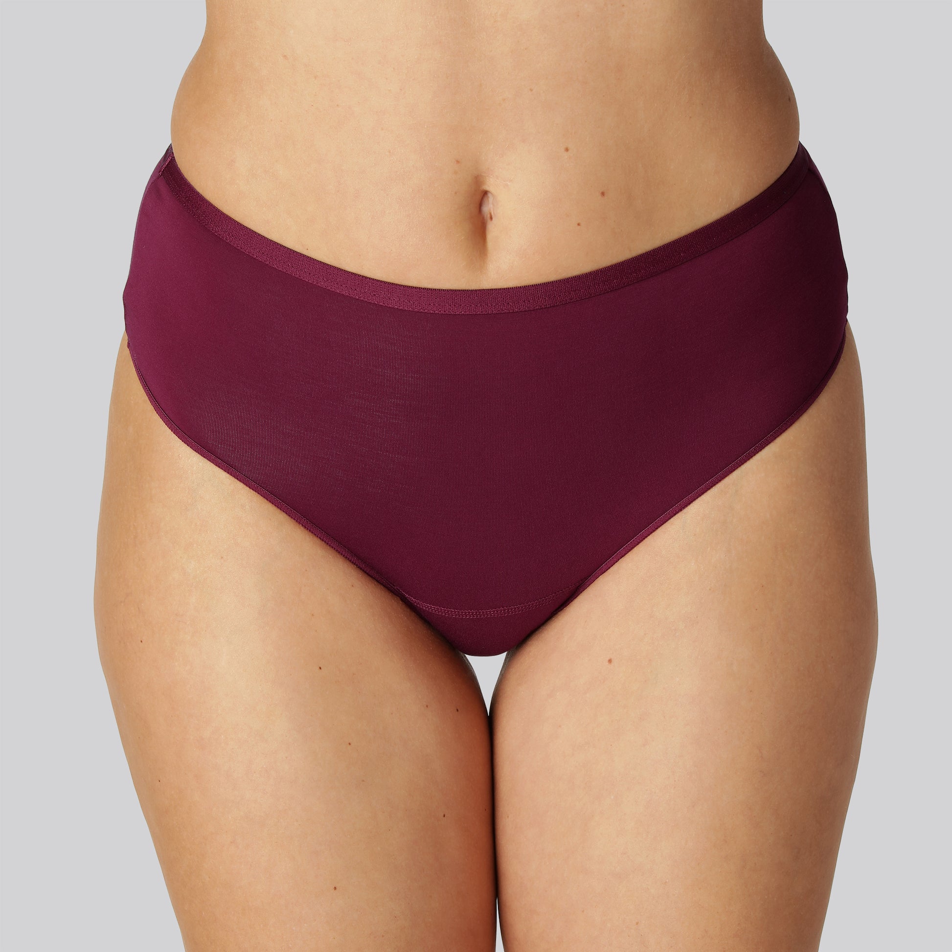 Damesstring van bamboe met hoge taille in bordeauxrood.